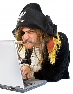 4865686-pirate-attacking-with-a-knife-a-laptop-computer.jpg