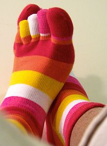 Almost all toe socks are multicolored or rainbow striped.  It's impossible to find normal toe socks because there's no such thing as normal toe socks.  